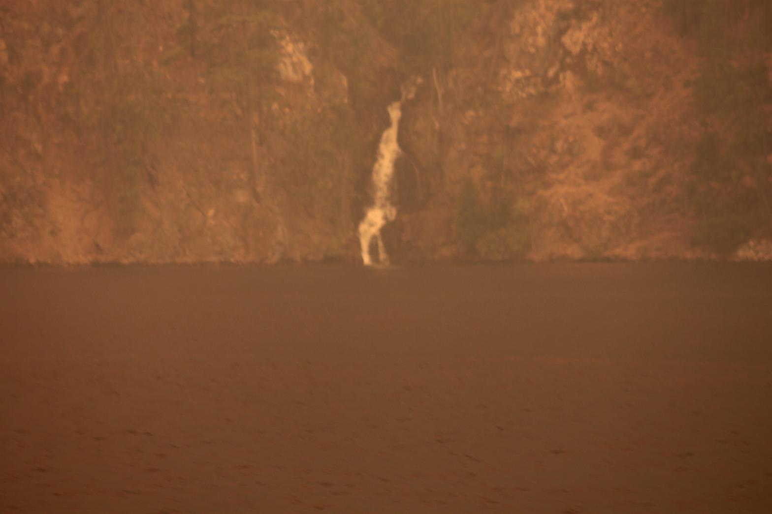 Domke Falls through the smoke of the Wolverine Fire